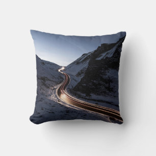 CURVY ROAD IN MIDDLE OF SNOW COVERED MOUNTAIN THROW PILLOW