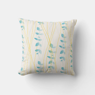 Cushion with difuminated leaf design.