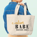 Custom Babe Funny Saying Personalized Name<br><div class="desc">Custom Babe Funny Saying Personalized Name Tote Bags features a simple design with the text "custom babe" in modern black and gold calligraphy script typography and personalized with your name. Perfect for a fun gift for mom, best friends, girlfriend, for birthday, Christmas, holidays, Mother's Day and more. Designed by Evco...</div>