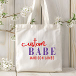 Custom Babe Funny Saying Personalized Name Tote Bag<br><div class="desc">Custom Babe Funny Saying Personalized Name Tote Bags features a simple design with the text "custom babe" in modern purple and red calligraphy script typography and personalized with your name. Perfect for a fun gift for mom, best friends, girlfriend, for birthday, Christmas, holidays, Mother's Day and more. Designed by Evco...</div>