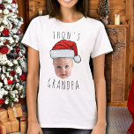 Custom Baby Face Santa Hat Christmas Photo T-Shirt<br><div class="desc">Custom Baby Face Santa Hat Christmas Photo, Replace the face of this baby with your favourite photo (make sure to crop as much to the face as possible and use an app to remove the background) and personalize this funny Christmas Holiday gift with your kid, husband, or boyfriend on it!...</div>