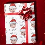 Custom Baby Face Santa Hat Christmas Photo Wrapping Paper<br><div class="desc">Funny Custom Baby Face Santa Hat Christmas Photo Wrapping Paper , Replace the face of this elf with your favourite photo (make sure to crop as much to the face as possible and use an app to remove the background) and personalize this funny Christmas Holiday Wrapping Paper with your kid,...</div>