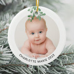 Custom Baby Name Photo Christmas Watercolor Ceramic Ornament<br><div class="desc">This cute Christmas Ornament is decorated with watercolor mistletoe.
Easily customizable with your baby's photo,  name,  and year.
Use the Design Tool to change the text size,  style,  or colour.
Because we create our artwork you won't find this exact image from other designers.
Original Watercolor © Michele Davies.</div>