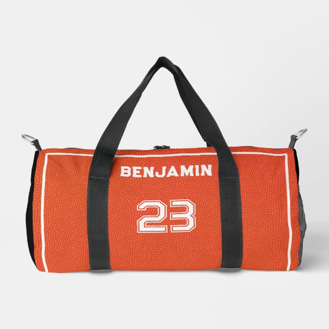 Custom Basketball Textured Player Number Orange Duffle Bag (Front)