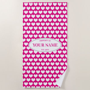 Custom beach towel with hot pink heart pattern