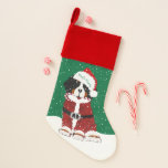 Custom Bernese Mountain Dog Santa Paws Christmas Stocking<br><div class="desc">Cute Personalized Christmas Holiday Bernese Mountain Dog wearing doodle scribble effect Santa suit and Santa hat holding candy cane in its mouth. Cute christmas stocking for berner lovers! Festive snowy background. © EMR Designs</div>