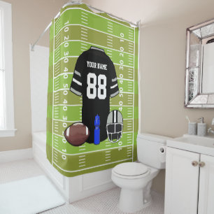 Custom Black and Gray Football Jersey on Field