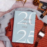 Custom Cute Blue Minimal 2025 Calendar  Planner<br><div class="desc">Stay organized in style with this elegant 2025 Zazzle planner. Featuring a modern, minimalist design with soft, earthy tones and a bold "2025" on the cover, this planner is perfect for keeping track of your daily schedule, goals, and important events. The sleek spiral binding ensures easy use, while the customizable...</div>