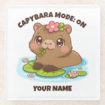 Custom Cute Kawaii Capybara Mode Glass Coaster<br><div class="desc">Custom Cute Kawaii Capybara Mode Glass Coaster 🥤🧡 Add capybara chill to your table! This adorable kawaii capybara glass coaster features a sweet capybara relaxing in water with lily pads and flowers — plus fully customizable text. In seconds, make it yours: edit the top phrase (keep “Capybara Mode: ON” or...</div>