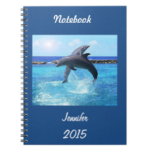 Custom dolphins playing in the ocean doing tricks notebook