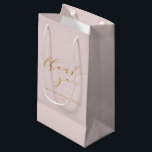 Custom Elegant Pink Script Thank You Bridal Shower Small Gift Bag<br><div class="desc">Show your gratitude in style with this Custom Elegant Pink Script Thank You Bridal Shower Small Gift Bag. Featuring a soft pink background and graceful script, this bag is perfect for presenting small gifts or favours to your guests. The elegant design adds a personalized touch, making it a beautiful keepsake...</div>