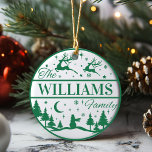 Custom Family Name Classic Christmas Keepsake Ceramic Ornament<br><div class="desc">Add a fun and festive touch to your Christmas tree this year with a personalized ornament that can be passed down for generations. This classic green and white design features reindeer flying above a pine filled snow-scape with a lone snowman standing guard. Personalize by adding your last name. Makes a...</div>