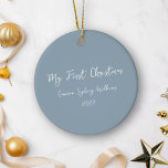 Custom First Christmas Script Baby Photo Blue Ceramic Ornament<br><div class="desc">Celebrate your newborn’s first Christmas with this personalized ceramic ornament. The front showcases elegant white script text on a dusty blue background, creating a serene and festive look. On the back, proudly display your favourite photo of your little one, making this ornament a cherished keepsake for years to come. Perfect...</div>