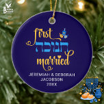 Custom FIRST HANUKKAH MARRIED Hebrew Ceramic Ornament<br><div class="desc">Cute FIRST HANUKKAH MARRIED ceramic ornament with CUSTOMIZABLE NAMES & YEAR. Hanukkah is written in Hebrew. Design shows Hanukkah blue handwriting script typography with blue and yellow dreidel. A beautiful souvenir for couples celebrating their first married Hanukkah. Design is repeated on the back. English version available separately. Also in white....</div>