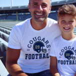 Custom Football Dad Navy Blue and Gold Team<br><div class="desc">Custom Front and Back Football T-Shirt for Dad - shown in White
Design for football dads features a football helmet with sporty text that can be customized for the team name,  son's last name,  and his jersey number. Gold and navy blue colours can be customized.</div>