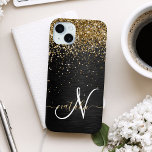 Custom Gold Glitter Black Sparkle Monogram iPhone 15 Mini Case<br><div class="desc">Easily personalize this trendy elegant phone case design featuring pretty gold sparkling glitter on a black brushed metallic background.</div>