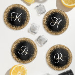 Custom Gold Glitter Black Sparkle Monogram Coaster Set<br><div class="desc">Easily personalize this trendy elegant coaster set design featuring pretty gold sparkling glitter on a black brushed metallic background.</div>