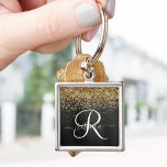 Custom Gold Glitter Black Sparkle Monogram Keychain<br><div class="desc">Easily personalize this trendy elegant keychain design featuring pretty gold sparkling glitter on a black brushed metallic background.</div>