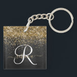 Custom Gold Glitter Black Sparkle Monogram Keychain<br><div class="desc">Easily personalize this trendy elegant keychain design featuring pretty gold sparkling glitter on a black brushed metallic background.</div>