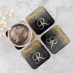 Custom Gold Glitter Black Sparkle Monogram Square Paper Coaster<br><div class="desc">Easily personalize this trendy elegant square paper coaster set design featuring pretty gold sparkling glitter on a black brushed metallic background.</div>