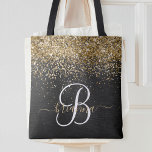 Custom Gold Glitter Black Sparkle Monogram Tote Bag<br><div class="desc">Easily personalize this trendy elegant tote bag design featuring pretty gold sparkling glitter on a black brushed metallic background.</div>