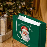 Custom Green From Santa Claus Kids Christmas Large Gift Bag<br><div class="desc">Customize this nostalgic from Santa Claus green gift bag with your own personalized text with your kids name in white script. This beautiful old fashioned drawing of Santa's red hat and white beard are the perfect holiday stickers for your children's presents under the tree on Christmas day.</div>