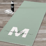 Custom Initial Name Monogram Sage Green Yoga Mat<br><div class="desc">Create Your Own Personalized Modern Bold Script Name Monogram Sage Green and White Double-Sided Yoga Mat. This chic, luxury yoga mat features a stylish monogram design with a soft sage green background and a bold white initial, overlaid with a flowing black script name for a personal touch. Designed for both...</div>