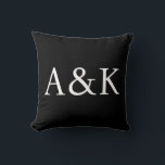 Custom Initials on Black Wedding Throw Pillow<br><div class="desc">This custom throw pillow features a clean, modern, and elegant design. Sample initials of the bride and groom are printed in the center in a sophisticated white font. The background is a solid black. You can personalize the pillow to include your own custom initials or other text of your choice....</div>