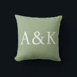 Custom Initials on Sage Green Wedding Throw Pillow<br><div class="desc">This custom throw pillow features a clean,  modern,  and elegant design. Sample initials are printed in the center in a sophisticated white font. The background is a luxurious sage green color. You can personalize the pillow to include your own custom initials or other text of your choice.</div>