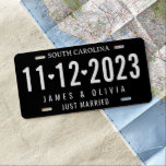 Custom Just Married Wedding Date on Elegant Black License Plate<br><div class="desc">Add a touch of sophistication to your vehicle with our Custom Just Married Wedding Date on Elegant Black License Plate. Celebrate your special day with a personalized,  sleek,  and timeless design that proudly displays your wedding date for all to see.</div>
