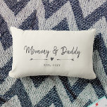 Custom Modern Mommy & Daddy New Parents Gift Lumbar Pillow<br><div class="desc">Celebrate the birth of your child with this chic farmhouse style throw pillow featuring your names and year establised in a charcoal vintage typewriter lettering and script design alongside sweet hand-drawn arrowsand heart. Choose your own background colour! This would make the perfect gift for a new parents at a baby...</div>