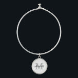 Custom monogram bangle bracelet with round charm<br><div class="desc">Custom monogram bangle bracelet with round charm.
Elegant monogrammed gift idea for women and girls.
Stylish script typography with name initial letter.
Trendy fashion accessories.
Cute wedding favour gift idea for bride,  bridesmaids,  wife,  girlfriend,  friend,  sister,  mom,  daughter etc.</div>