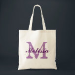 Custom Monogram Name Purple Tote Bag<br><div class="desc">Custom Monogram Name Purple Tote Bag. Elegant monogram logo design with monogrammed letter initials in a grunge font and name in dark purple script font. Easily replace the template monogram initials and the name with your own.Cute gift idea for all at a wedding specially for bride and bridesmaids or close...</div>