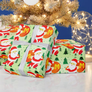 Custom monogram Santa Claus delivering gift to you Wrapping Paper