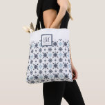 Custom Monogram Snowflake  Tote Bag<br><div class="desc">Capture the magic of the season with our whimsical Monogram Snowflake Tote Bag, adorned with intricate blue and white snowflakes that dance across the design. Add your initial and name in the square at the top for a fun little touch for your Christmas, Hanukkah, or winter feel! Look for coordinating...</div>