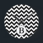 Custom Monogrammed Large Black Chevron Design Round Clock<br><div class="desc">This product features a classic large black and white chevron  zig-zag design with a personalized monogram initial. You can customize the initial or add your own text on the product order page.</div>