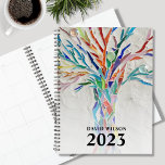 Custom Name 2023  Planner<br><div class="desc">This unique Planner is decorated with a brightly coloured tree. The original design was made in mosaic using tiny pieces of glass. Customize it with your name and year. To edit further use the Design Tool to change the font, font size, or colour. Because we create our artwork you won't...</div>