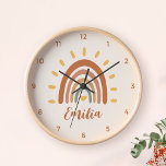 Custom Name Boho Earth Tone Rainbow Sun<br><div class="desc">The Custom Name Boho Earth Tone Rainbow Sun wall clock is a unique and stylish piece of home decor that combines bohemian and earthy elements with a vibrant rainbow sun. In addition to the striking graphic, the clock can also be customized with your own name, making it a truly personalized...</div>