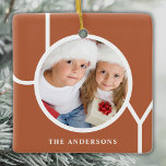 Custom Name Christmas Photo Rust Ceramic Ornament<br><div class="desc">This modern Christmas Photo Ornament is decorated with the word JOY on a terracotta,  rust background.
Easily customizable with your photo and name.</div>