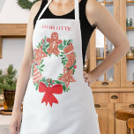 Custom Name Christmas Wreath Apron<br><div class="desc">This cute and charming Christmas apron is decorated with a watercolor festive wreath of Christmas cookies.
Easily customizable.
Use the Design Tool to change the text size,  style,  or colour.
As we create our artwork you won't find this exact image from other designers.
Original Watercolor © Michele Davies.</div>