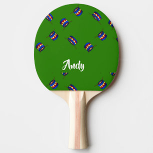 Custom name drums pattern on green ping pong paddle