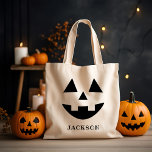 Custom Name Jack O Lantern Pumpkin Face Halloween Tote Bag<br><div class="desc">Celebrate Halloween in style with this cute pumpkin face tote bag with custom text that can be personalized with a name. This fun jack o lantern design has a happy toothy grin!</div>