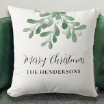 Custom Name Mistletoe Christmas Throw Pillow<br><div class="desc">This festive pillow is decorated with watercolor mistletoe and Merry Christmas in stylish typography.
Easily customizable with your family name.
Because we create our artwork you won't find this exact image from other designers.
Original Watercolor © Michele Davies.</div>