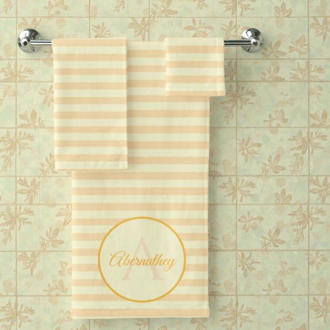 Custom Name Monogram Pastel Yellow Orange Striped Bath Towel Set (Pastel yellow & orange striped bathroom towel set with initial monogram displayed on bathroom rack. )