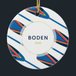 Custom Name Oars Modern Christmas Ceramic Ornament<br><div class="desc">Dress up your tree with this modern nautical themed ornament featuring oars in vibrant blues,  greens and coral. Customize with a message or name of your choice and year.</div>