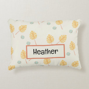 Custom name orange tropical leaves cream accent pillow