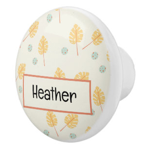 Custom name orange tropical leaves cream ceramic knob