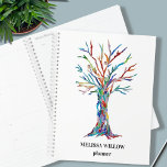 Custom Name Planner<br><div class="desc">This decorative planner features a print of a rainbow-coloured Tree of Life.
Easily customizable.
Use the Design Tool to change the text size,  style,  or colour.
Because we create our artwork you won't find this exact image from other designers.
Original Mosaic Design © Michele Davies</div>