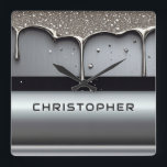 Custom Name With Dripping Liquid Metal Square Wall Clock<br><div class="desc">Polished chrome nameplate reading NAME with dripping liquid metal and strong reflective highlights. Embossed 3D typography on a sleek dark background evokes luxury,  modern branding,  industrial design and custom identity.</div>