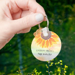 Custom Name Yoga Instructor Sunflower Keychain<br><div class="desc">This modern botanical Yoga Instructor Keychain is decorated with a yellow sunflower on a watercolor background.
Easily customizable.
Use the Design Tool to change the text size,  style,  or color.
As we create our artwork you won't find this exact image from other designers.
Original Watercolor © Michele Davies.</div>